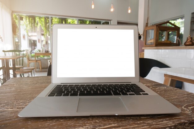 The Casual business woman works online on laptop which hand on keyboard in her house Isolated screen in laptop (blank white screen).