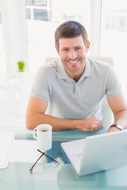 Casual businessman at desk