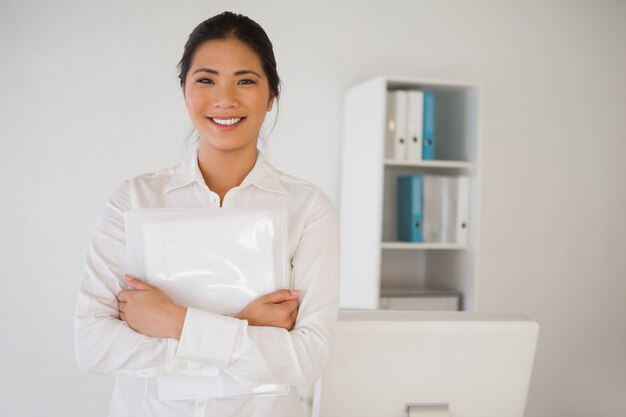 Casual businesswoman smiling at camera