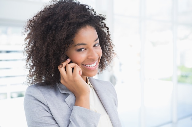 Casual businesswoman talking on phone