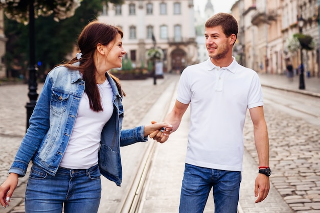 Casual cute couple walking through the city