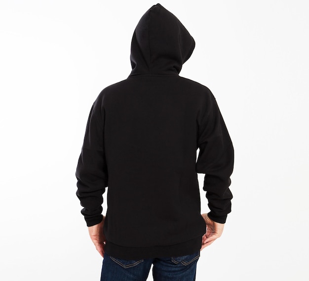 Casual image of caucasian male wearing a black hoodie photographed in studio Black sweatshirt mockup