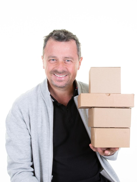 Casual man holding parcel boxes package on white background