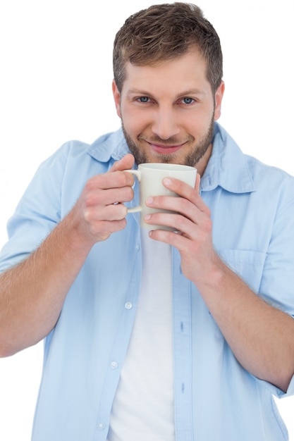 Casual model holding a mug