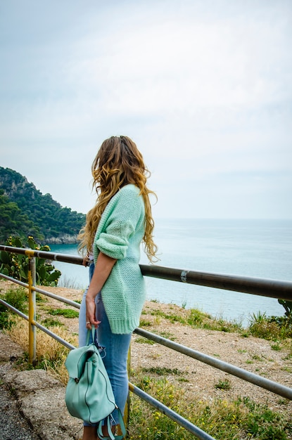 Casual outfit, oversize sweater, jeans and stylish accessories