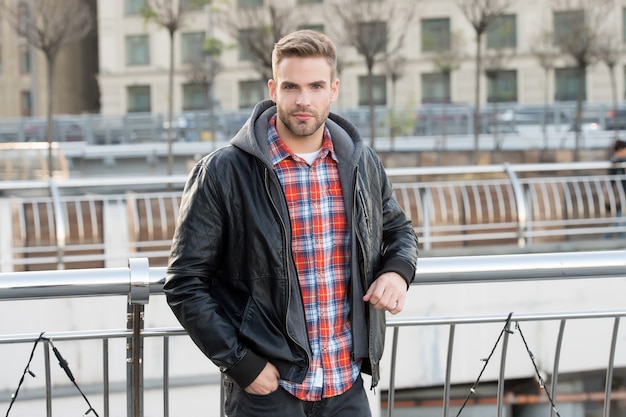 Casual purposes comfort. Handsome guy in casual style. Young man wear casual clothing on urban outdoors. Casual wardrobe for men. Spring or autumn season. Urban lifestyle.