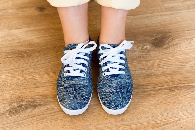 Casual sneakers on woman feet