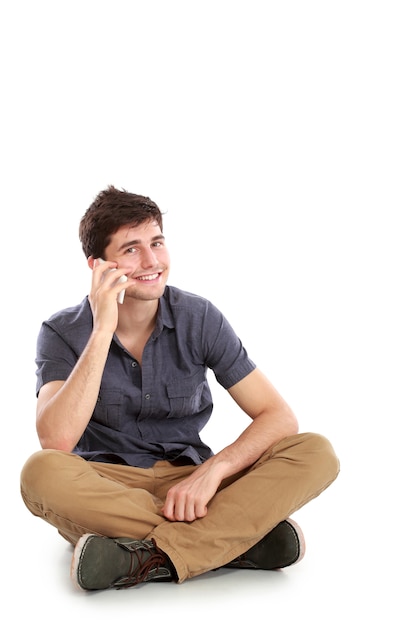 Casual young man speaking on the phone