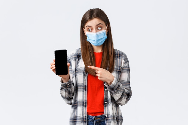 Casual young woman wearing protective mask