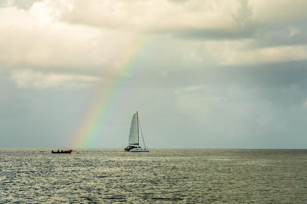 Catamaran at Rodney bay with rainbow in the backround Saint Lucia Caribbean sea