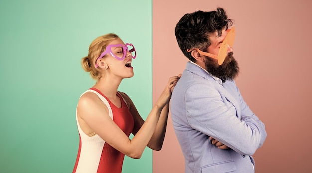 Catch my wave Party vibes Couple having fun Office party Celebrating success Relax and have fun Corporate culture Celebrating holiday Bearded man pretty woman party goggles celebrating