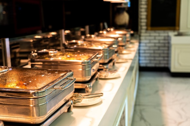 Photo catering buffet food with heated trays ready for service