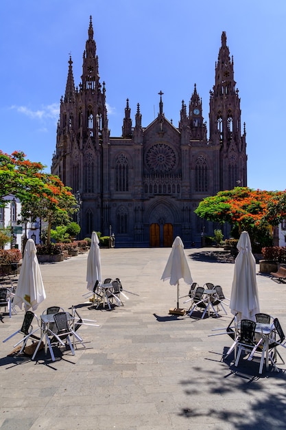 Cathedral or church of the Canarian city of Arucas on the island of Gran Canaria, main facade in the town square. Spain. Europe.