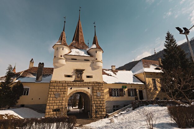 Catherine's gate in brasov on winter day, romania