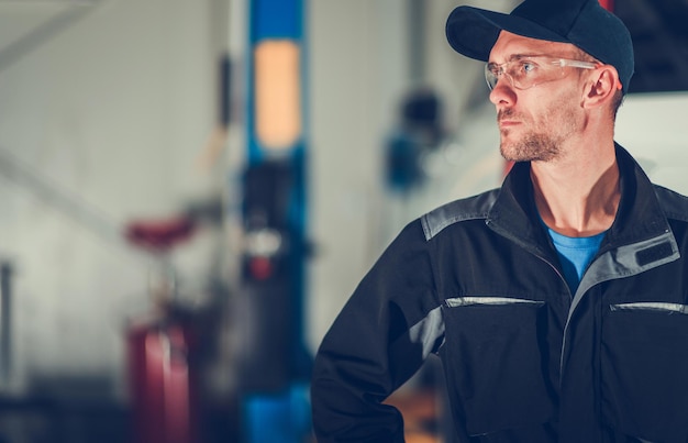 Caucasian automotive car service technician portrait