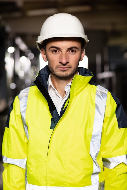 Caucasian business people in hard hat or safety wear\
professional male industry engineer specialist