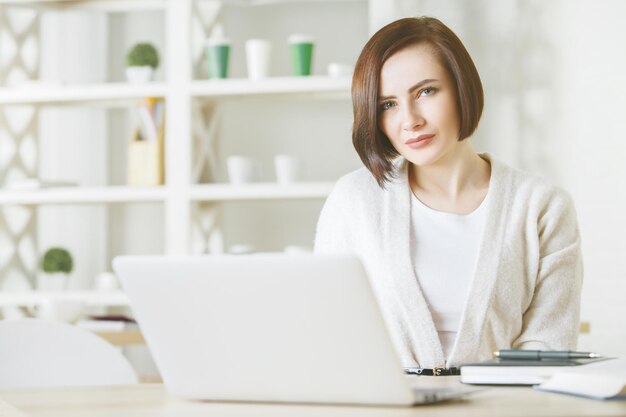 Caucasian business woman working on project