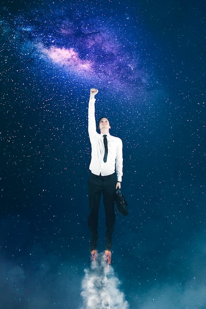 Photo caucasian businessman flying in night sky