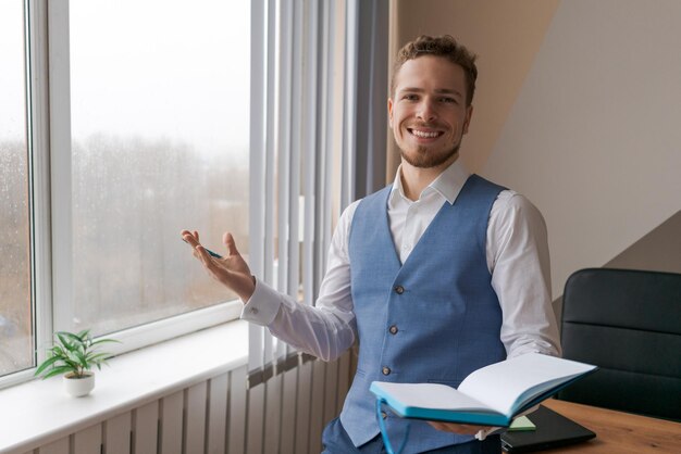 Caucasian businessman writing in notebook male hands holding pen making notes