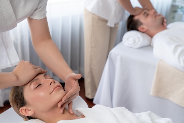 caucasian couple enjoying relaxing antistress head massage quiescent