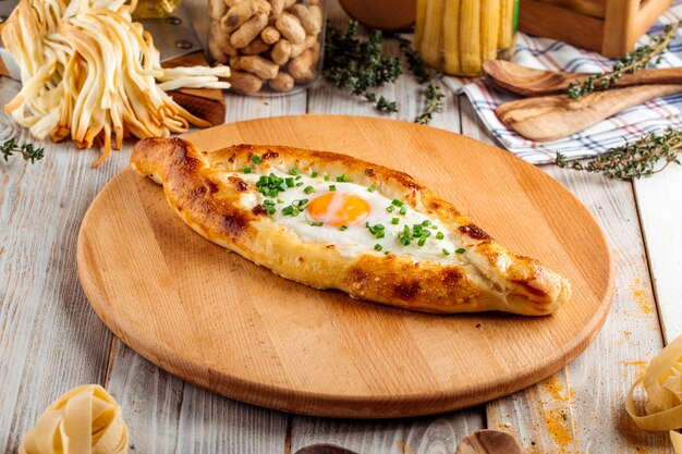 Caucasian cuisine Adjarian khachapuri with egg