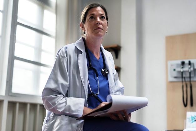 A Caucasian doctor working at a hospital