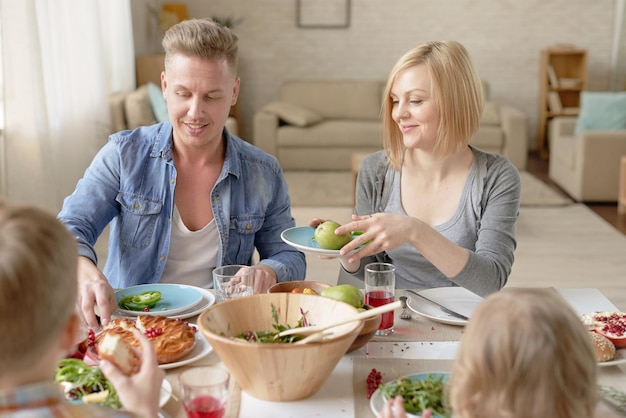 Caucasian Family at Dinner Table