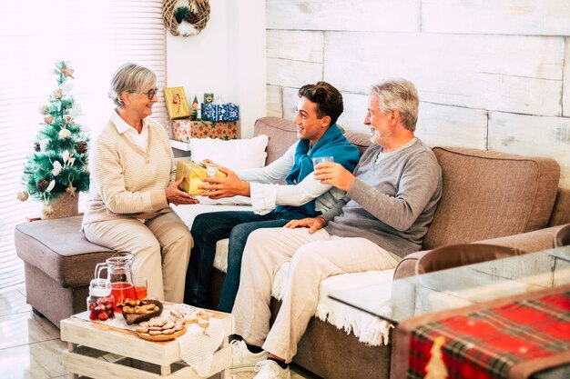 Caucasian family sharing gifts each other