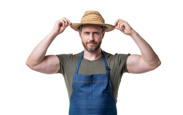 Foto lavoratore agricolo caucasico in cappello e grembiule isolato su sfondo bianco