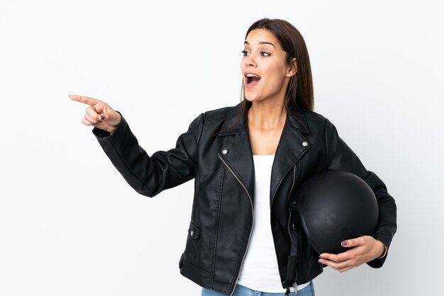 Caucasian girl holding a motorcycle helmet