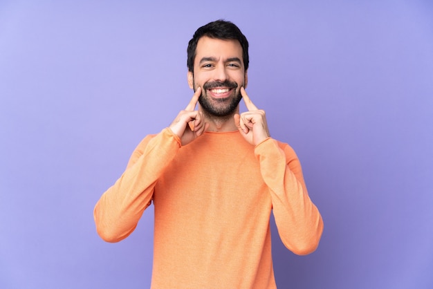 Caucasian handsome man smiling with a happy and pleasant expression