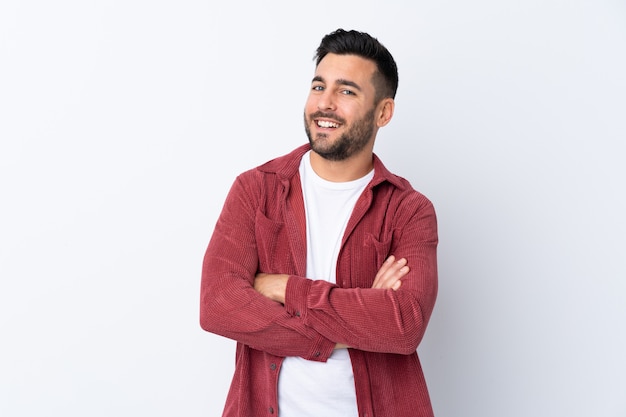 Caucasian handsome man over white wall