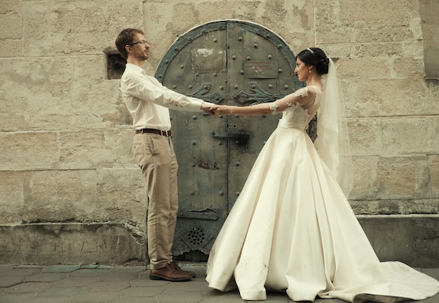 Caucasian happy romantic young couple celebrating their marriage