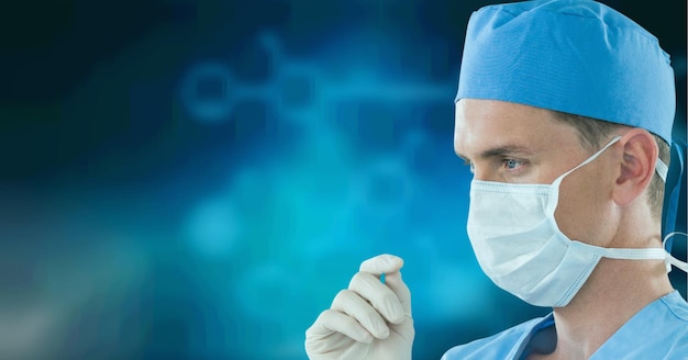 Caucasian male surgeon wearing surgical gloves against chemical structures on blue background