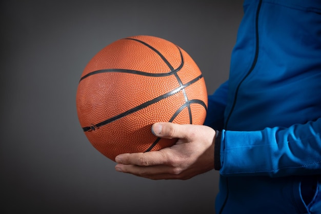 Caucasian man holding basketball ball