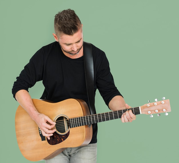 Caucasian Man Playing Guitar