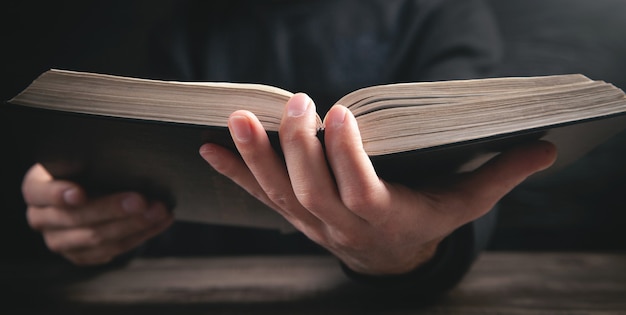 Premium Photo | Caucasian man reading the holy bible.