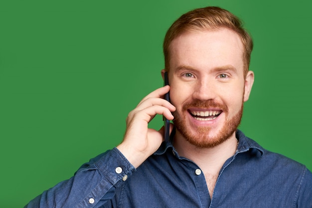 Caucasian man talking on phone