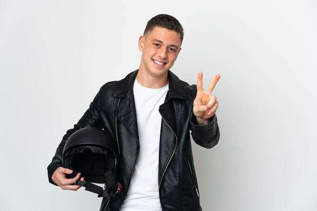 Caucasian man with a motorcycle helmet isolated