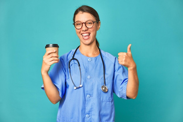 Caucasian nurse with takeaway coffee