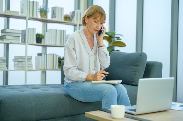 A caucasian senior Businesswoman working in modern office