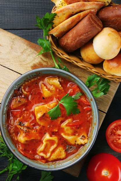 Caucasian soup with noodles. lagman and khachapuri on wooden table top view.