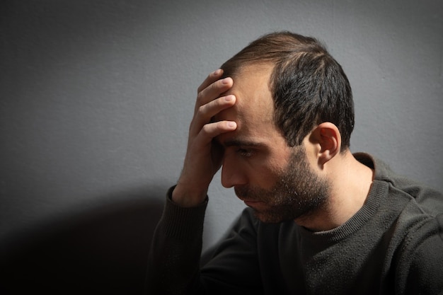 Caucasian stressed man at home