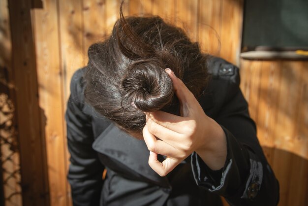 Caucasian woman corrects beautiful hair