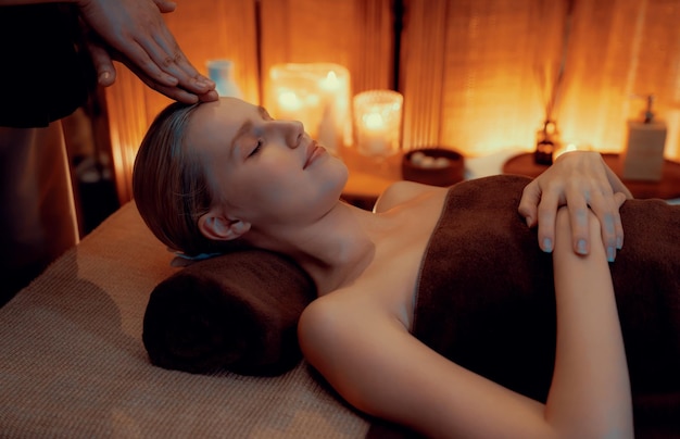 Caucasian woman enjoying relaxing antistress head massage quiescent