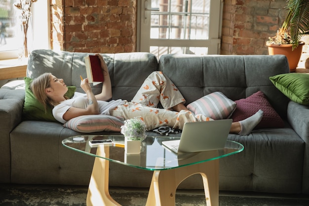 Caucasian woman freelancer during the work in home office while quarantine