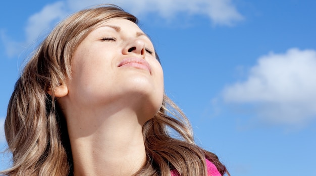 Caucasian woman is relaxing outdoor 