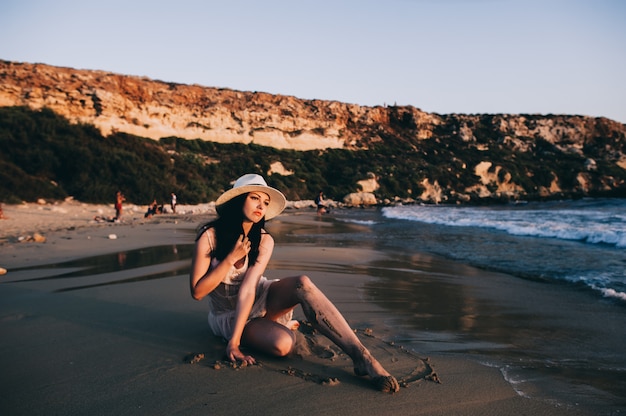 Caucasian woman rests at beautiful seashore