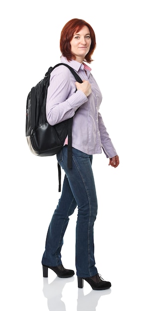 Caucasian woman student walking on white background