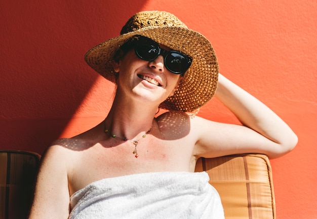 Caucasian woman sunbathing in summertime